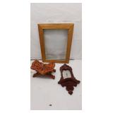 Assorted Decorative Items: Frames, Mirror, and Car