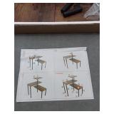 Unassembled Wood-Look Table with Black Legs