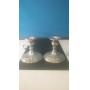 Pair of sterling silver candlesticks four inches