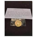 Twenty four karat gold plated washington quarter