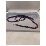 Amethyst and fourteen k gold necklace