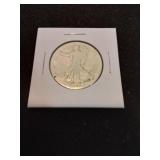 Silver half dollar date on illegible