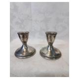 Sterling silver weighted candlesticks set four