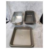 3 metal baking pans including 2 loaf pans