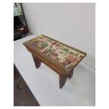 Sweet wooden bench with plant motif