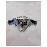 Cadillac and guns belt buckle