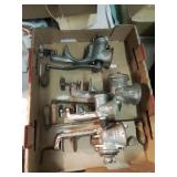 Group of four antique counter mount grinders