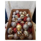 Flat of many christmas ornaments