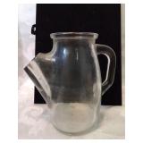 Interesting clear jug.Pitcher six inches