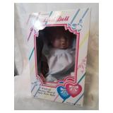 Wind up moving musical half hour baby doll
