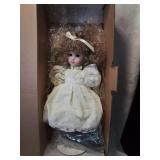 Maryse Nicole porcelain doll on stand