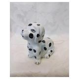 Black and white ceramic dog four inches tall