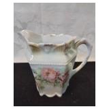 Porcelain creamer with roses
