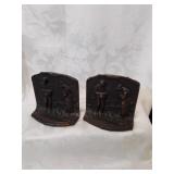 Cast metal bookends with a copper wash finish