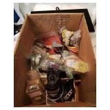Box of vintage fishing items including reels and
