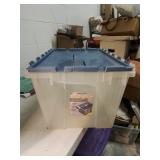 Flip top storage tote with blue lid