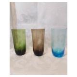 Group of three mid century colored glasses