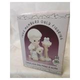 Precious moments members only figurine