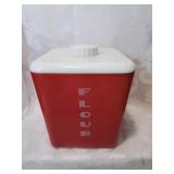Vintage red and white flour canister