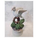 Musical porcelain bird sculpture working