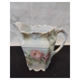 Porcelain creamer with roses