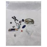 Oldsmobile belt buckle and group of small items