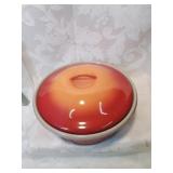 Orange enamel wear casserole with lid clean