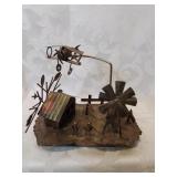 Metal art with windmill and airplane