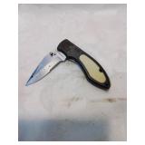 Stainless steel folding knife with belt clip