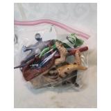 Bag of dinosaur toys