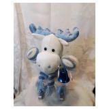 Plush holiday elk on skates