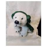 Plush white holiday bear with green scarf