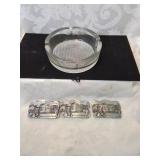 Glass astray with three old settler