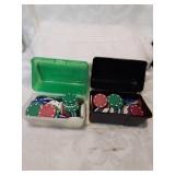 Two containers of poker chips