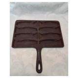 Cast iron fish cornbread pan