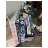 Box of games , including wheel of fortune and