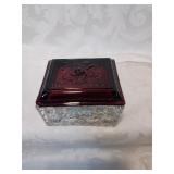 Class dresser box with ruby lid , small chip to