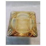 Amber glass ashtray
