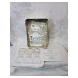 Angel and star cookie cutters in metal box