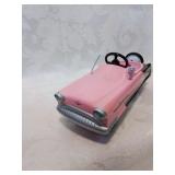 Hallmark , nineteen fifty six pink kidillac