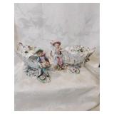 Pair of bone , china , hand painted figurines ,