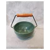 Green pottery bowl with wood handle five inches