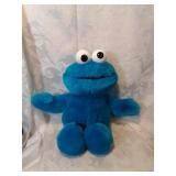 Plush tickle me cookie monster