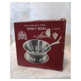 New stainless steel gravy bowl with ladle complete