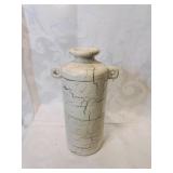 Pottery two handled vase eight inches tall