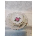 Set a four gold trimmed leap shape dishes with