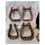 Group of four vintage stirrups