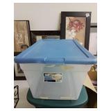 Clear rubber tote with blue lid