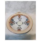 Single handle shallow bowl with flowers