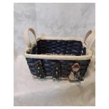 Small holiday , basket with snowman and trees